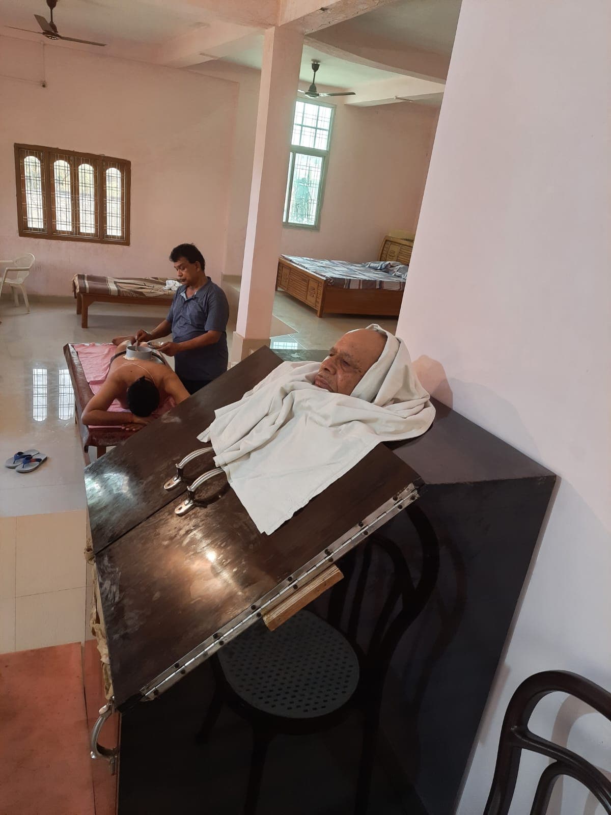 Ayush Clinic treatment room with Swedana and Panchakarma therapies